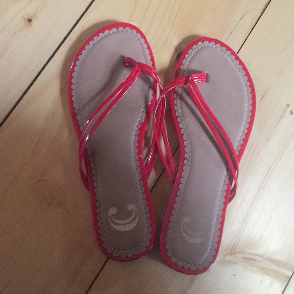 Charming Charlie’s red flip flops
